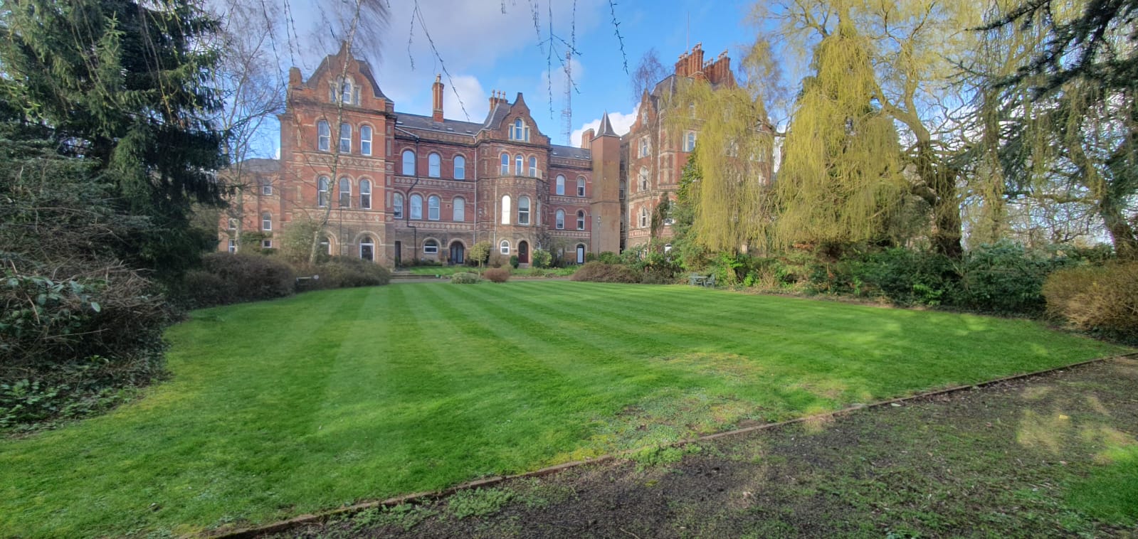 Hine Hall — grounds maintenance by Tall Trees Landscapes