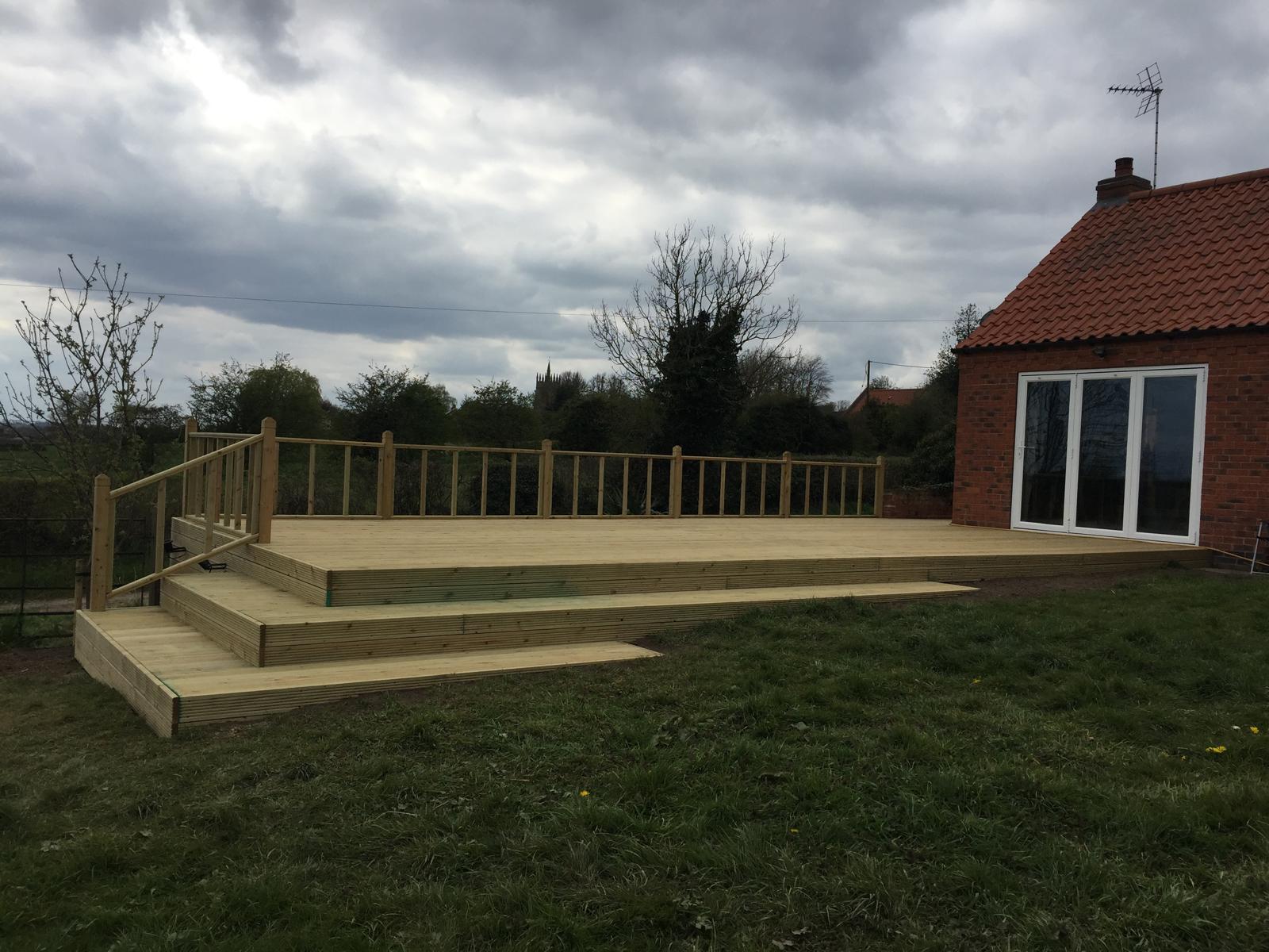 Large raised timber deck with balustrade