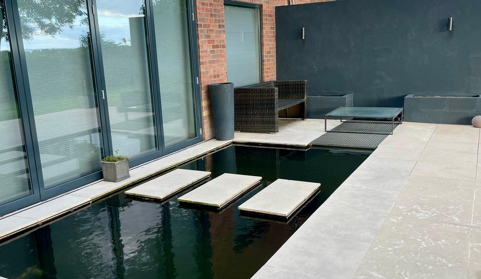 Modern reflection pool with floating slabs