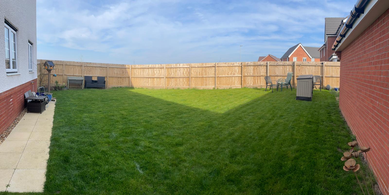 Garden before transformation — blank lawn